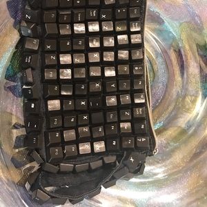 Recycled keyboard bag/wristlet.